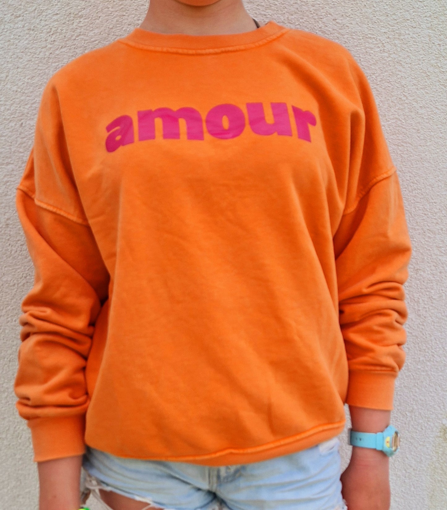 Amour Sweater in Orange and Pink.