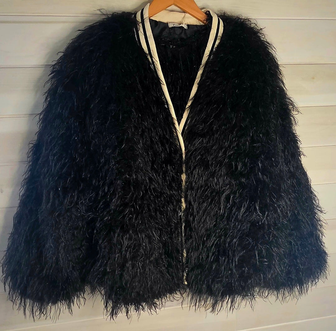Black Luxe, feather bomber with striped trim and snap fasteners
