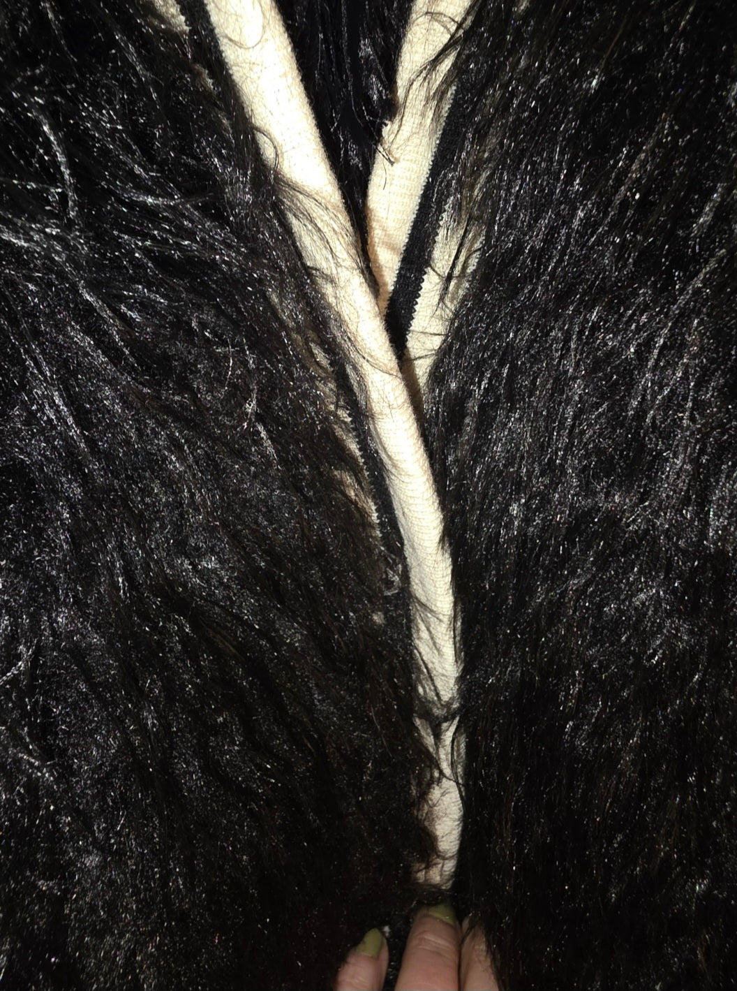 Black Luxe, feather bomber with striped trim and snap fasteners