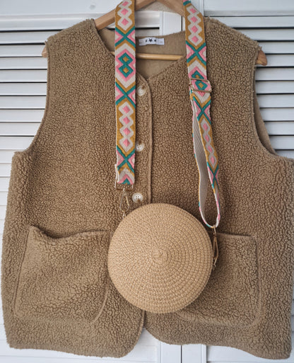 Small, round raffia bag with patterned strap