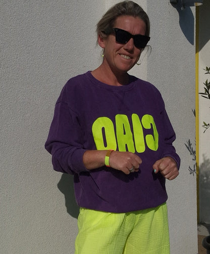 Ladies purple sweatshirt with Neon yellow Ciao.