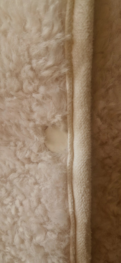Faux Shearling Gilet in Cream with pockets. Suede feel lining.