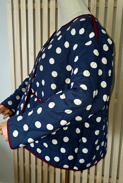 Navy & White dotty quilted, collarless jacket.