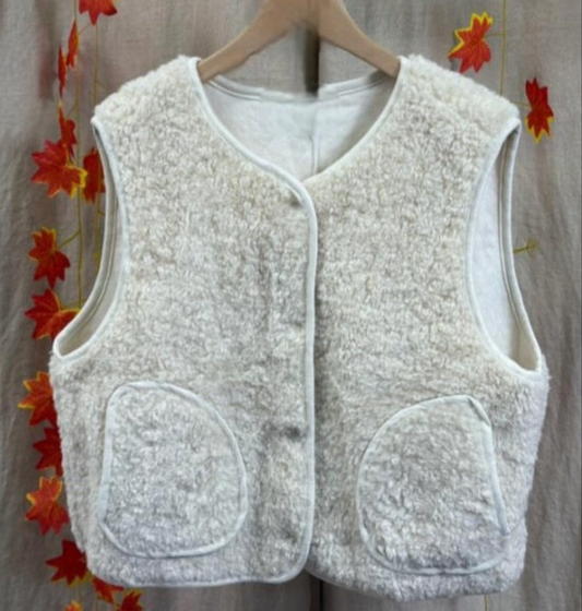 Faux Shearling Gilet in Cream with pockets. Suede feel lining.