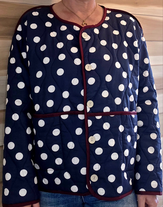 Navy & White dotty quilted, collarless jacket.