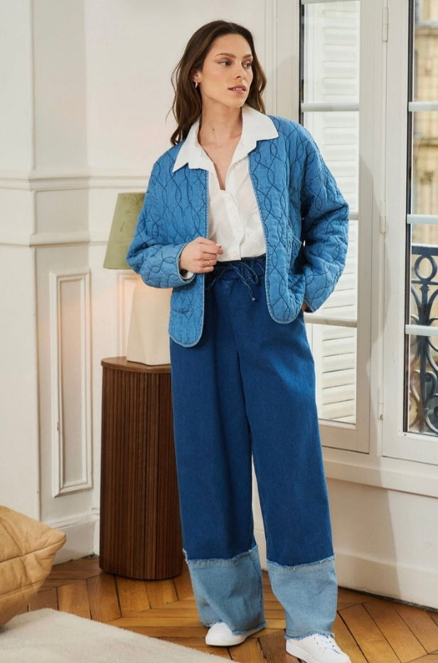 Collarless, Quilted Denim jacket. Open with pockets.