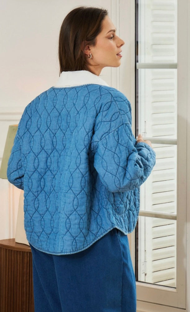 Collarless, Quilted Denim jacket. Open with pockets.