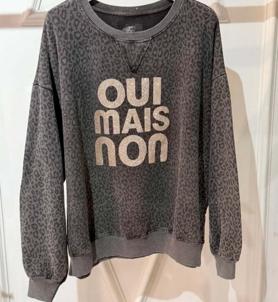 Oui Mai Non, Animal Print, faded black sweatshirt.