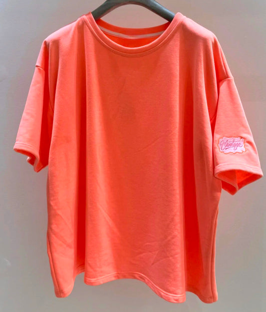 Neon Coral Short sleeve Sweater. Vintage logo on sleeve
