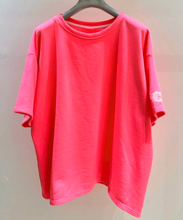 Neon Pink Tee/Light Sweater. Vintage logo on sleeve