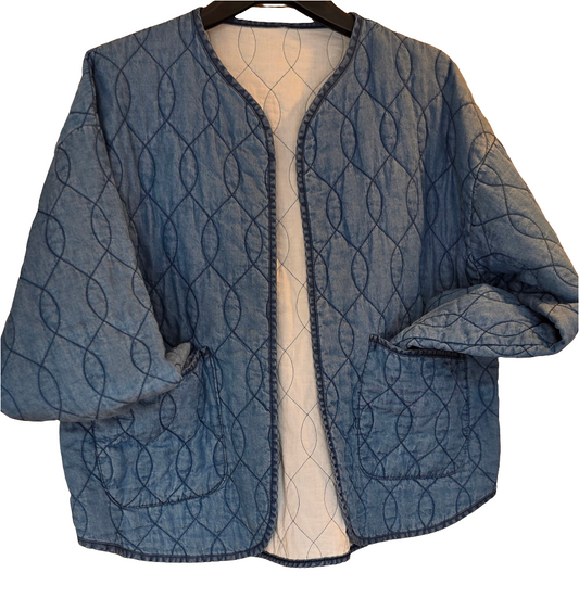 Collarless, Quilted Denim jacket. Open with pockets.