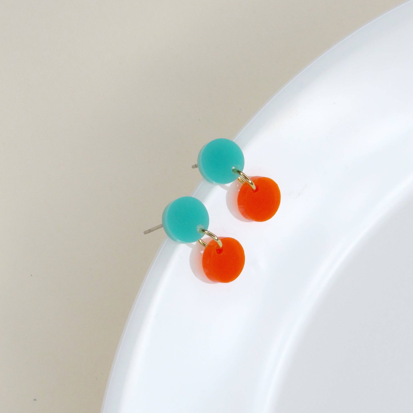 Dotty acrylic earrings in turquoise and neon orange