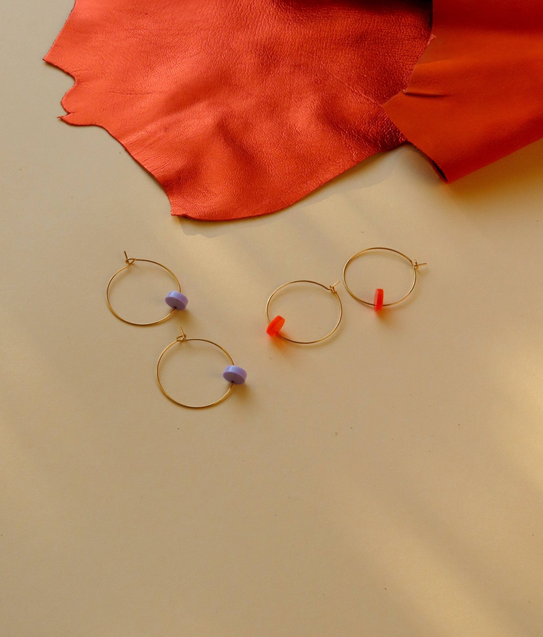 Neon orange dots hoops made of stainless steel - Cockleshell Crosshaven