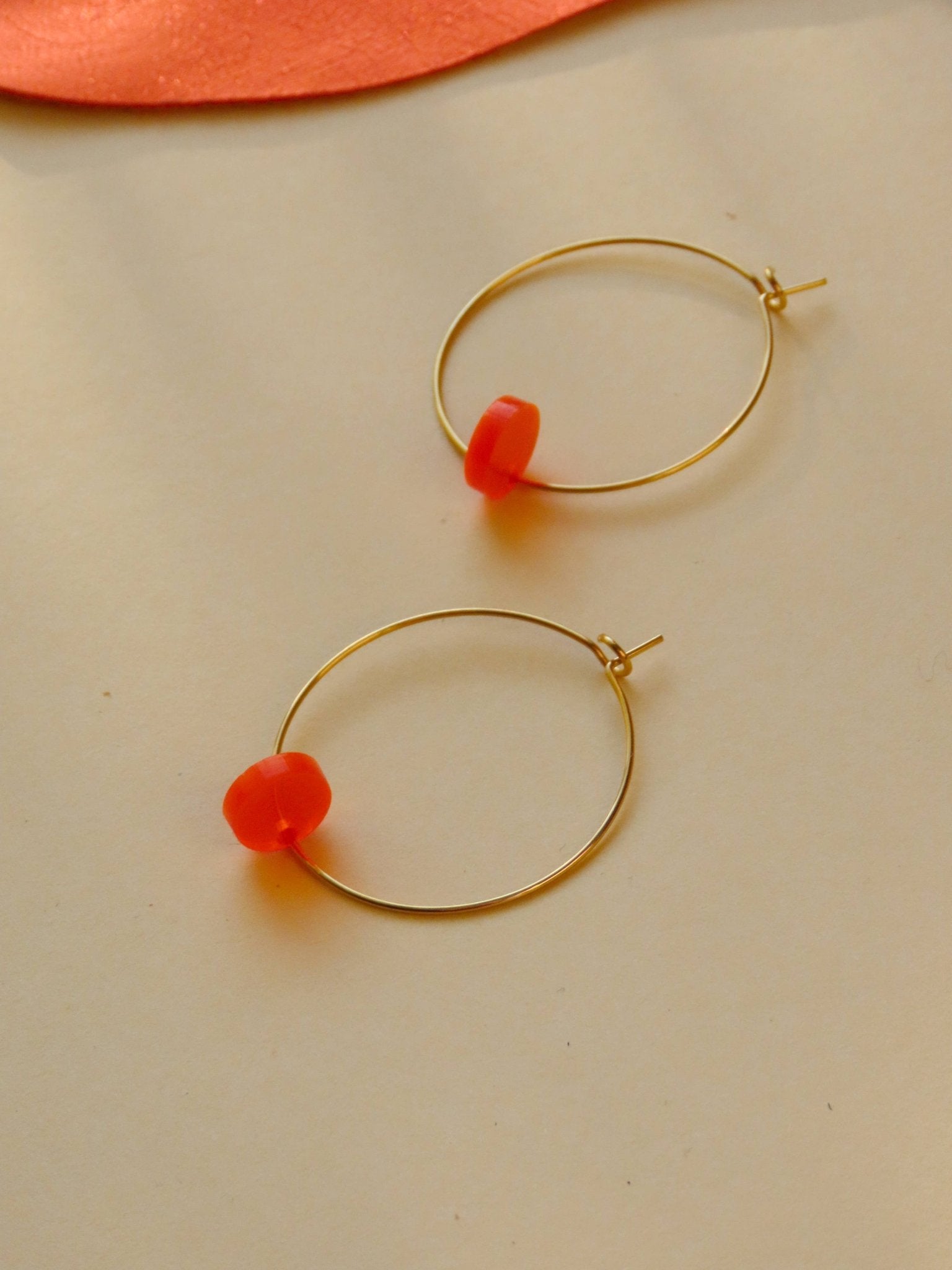 Neon orange dots hoops made of stainless steel - Cockleshell Crosshaven
