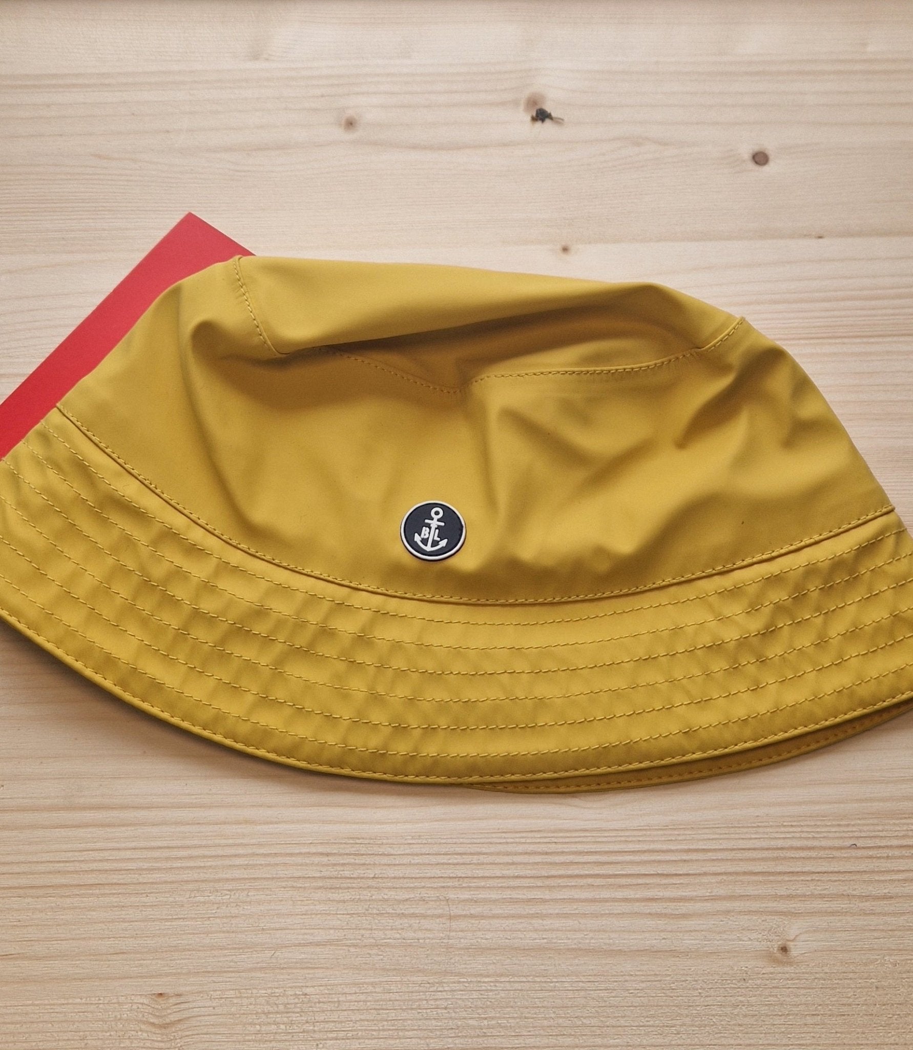 Unisex, yellow, waterproof, fleece lined hat - Cockleshell Crosshaven